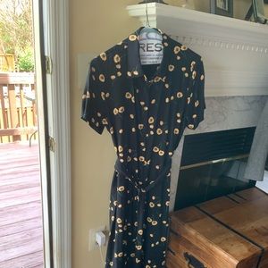 Black summer dress with peach flower detail
